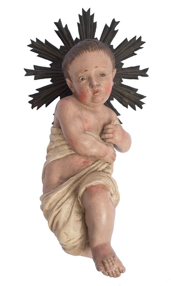 Italia meridionale, XVIII-XIX secolo - Gesù bambino nella culla con drappo in avorio