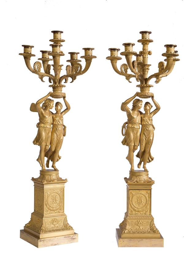 Important pair of candlesticks with six lights in gilded bronze, France or Milan, 1815