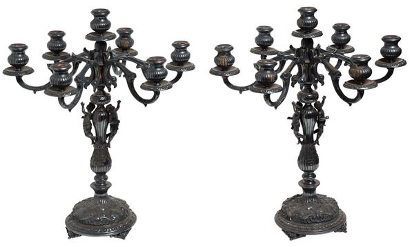 Coppia di  grandi candelabri : a sette luci  - in metallo argentato scuro - Asta Gioielli, Arredi e Oggetti d'arte - Blindarte Casa d'Aste