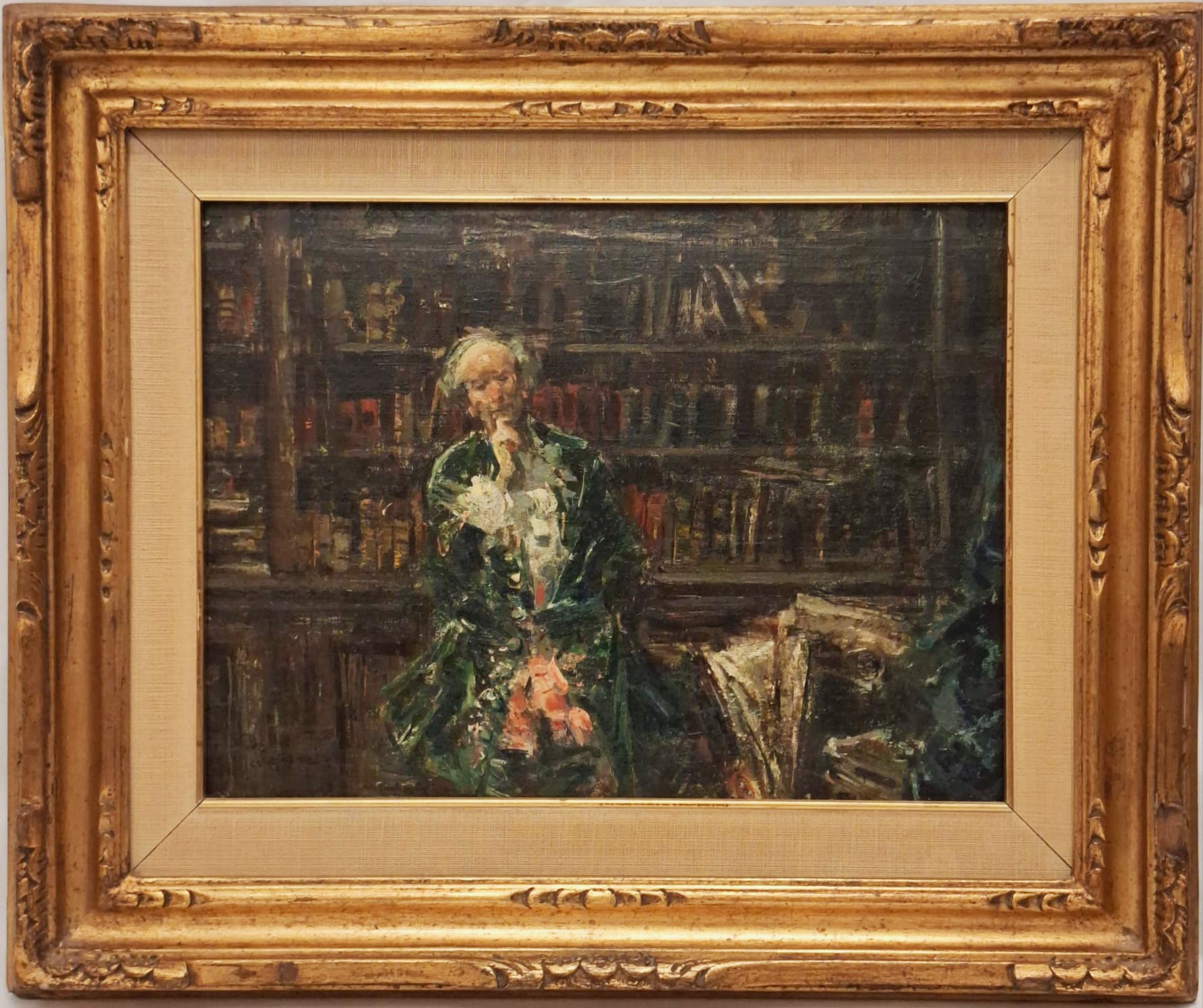 Gentiluomo in una biblioteca