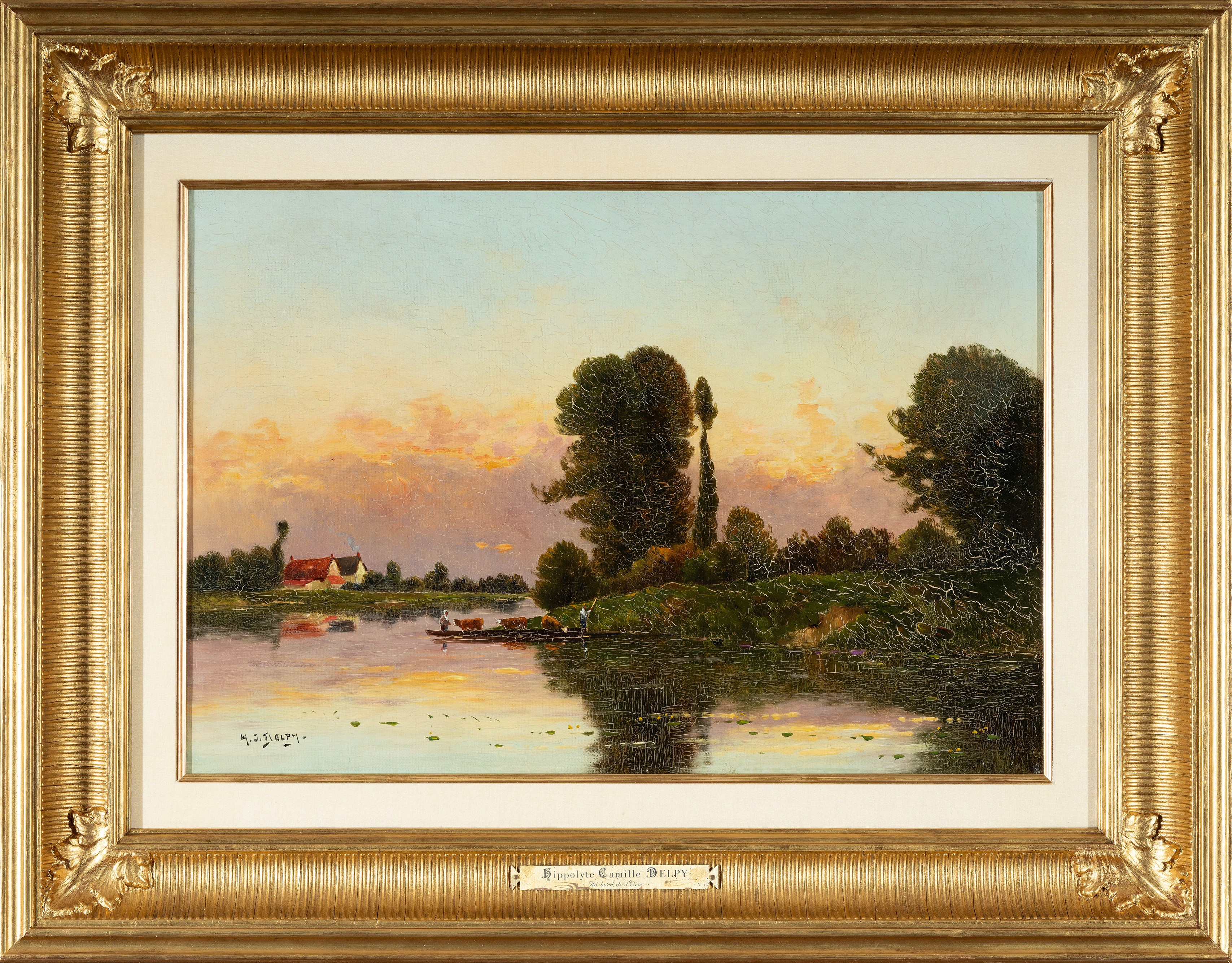 Lavandaie presso un fiume al tramonto