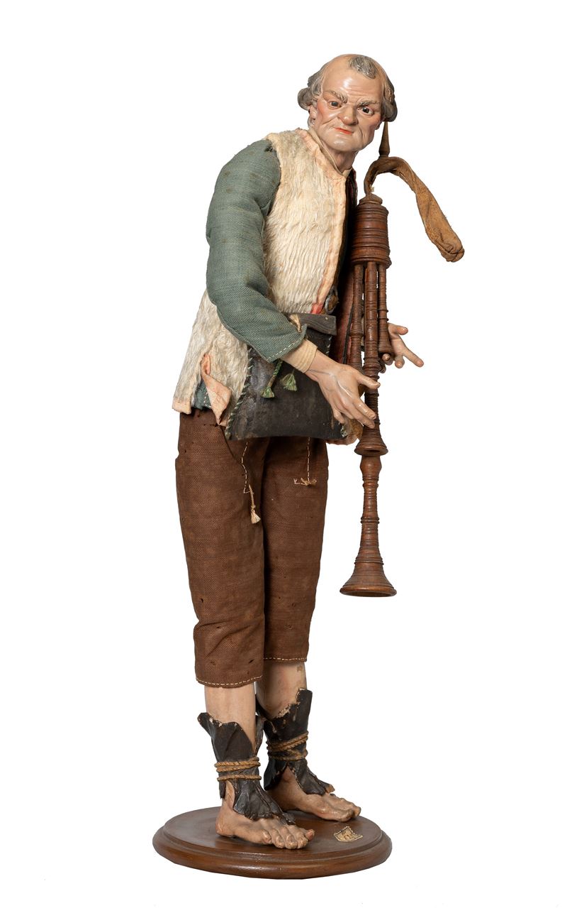 Scultura da presepe raffigurante suonatore di zampogna