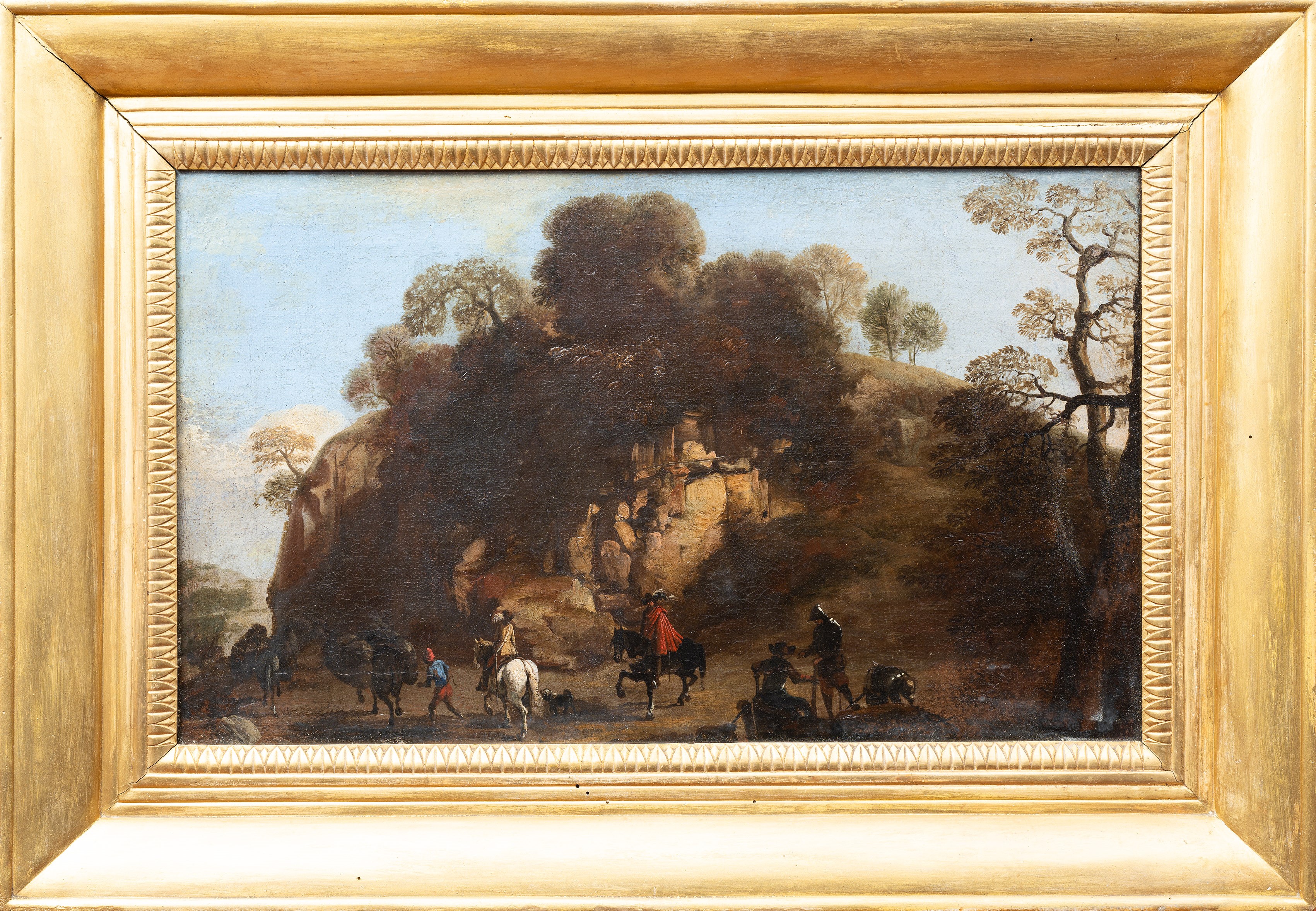 Cavalieri in un bosco presso un'altura