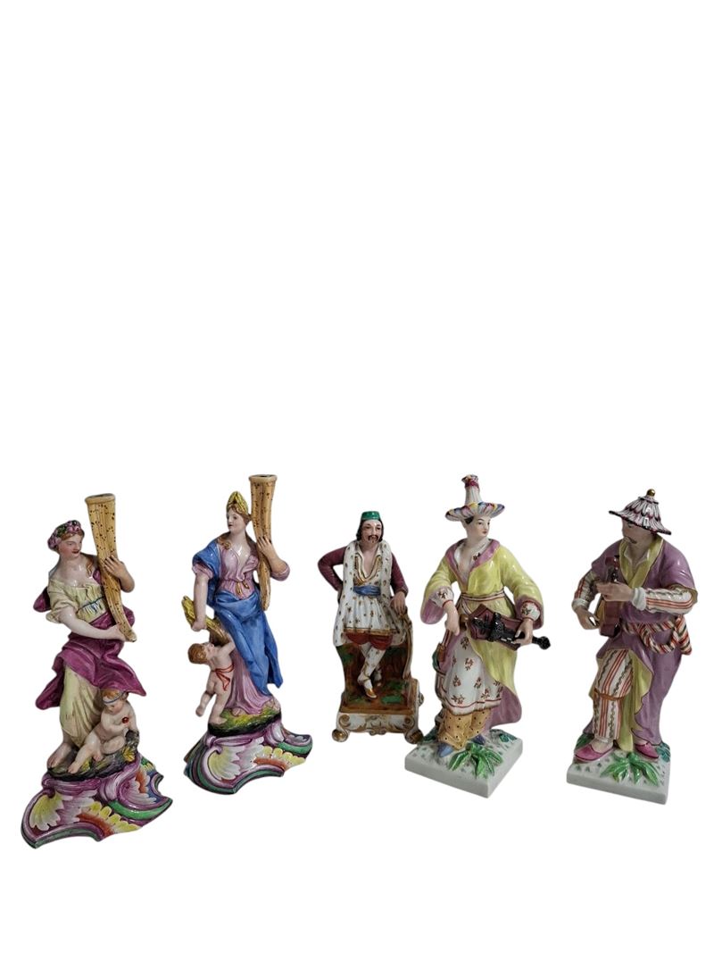 a)Coppia di figure femminili reggicandele; b) Statuetta porta profumo; c) Coppia di musicisti cin...