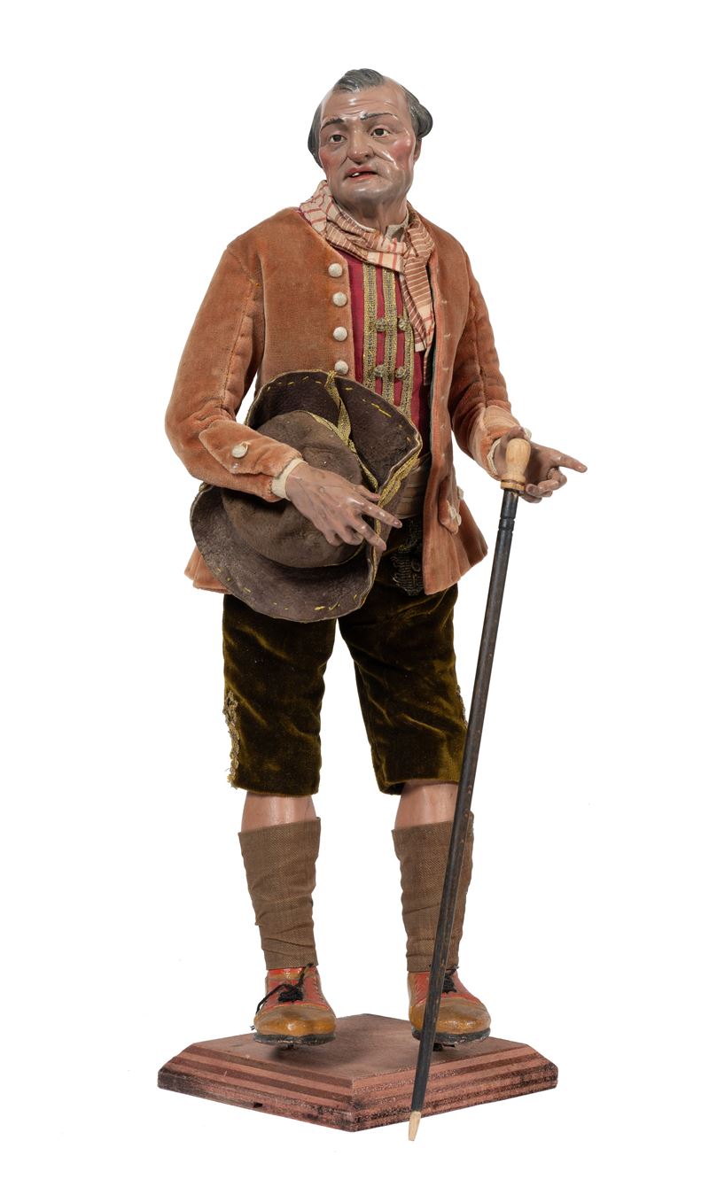 Figura di nobiluomo con cappello e bastone