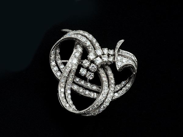 Spilla a motivo di fiocco