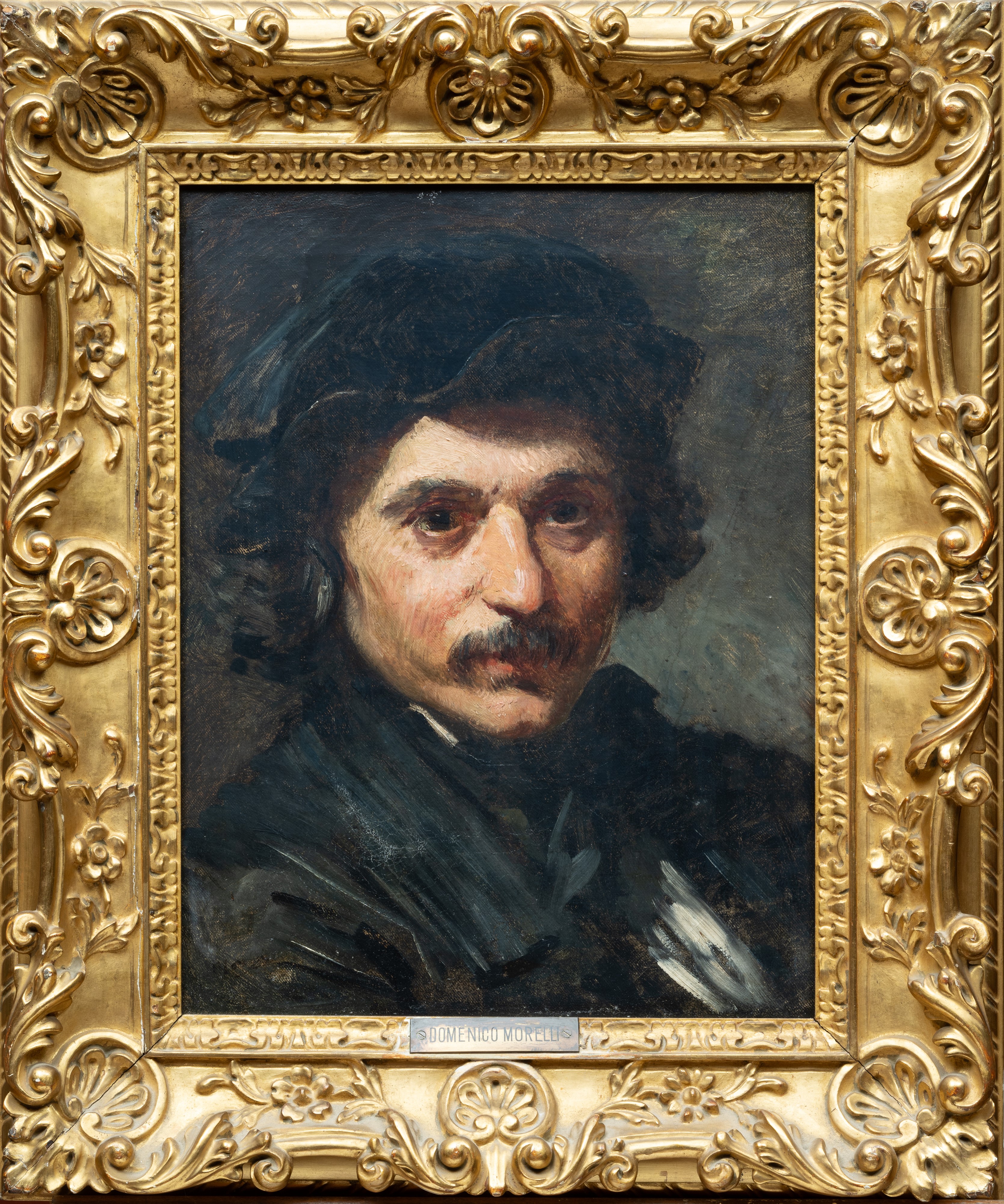 Ritratto di giovane con baffi e cappello
