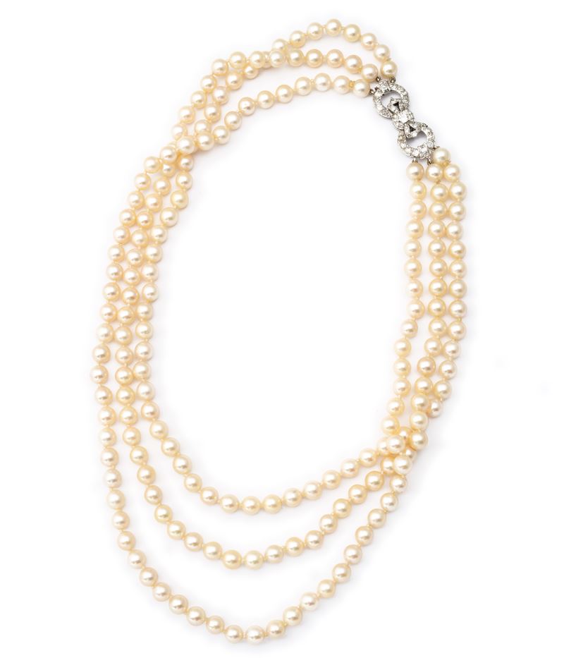 Collana di perle con fiocco di diamanti